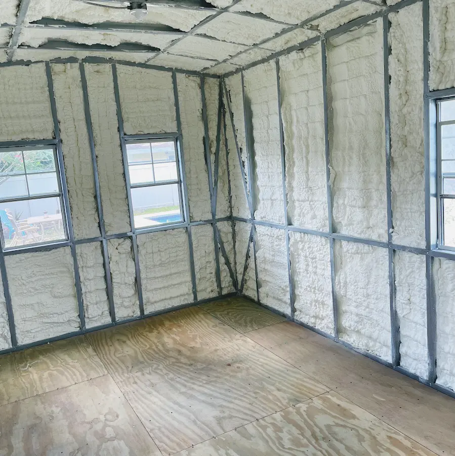 Closed-cell spray foam insulation applied to wall cavities in a residential project in Morrow
